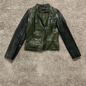 Green leather jacket with black sleeves